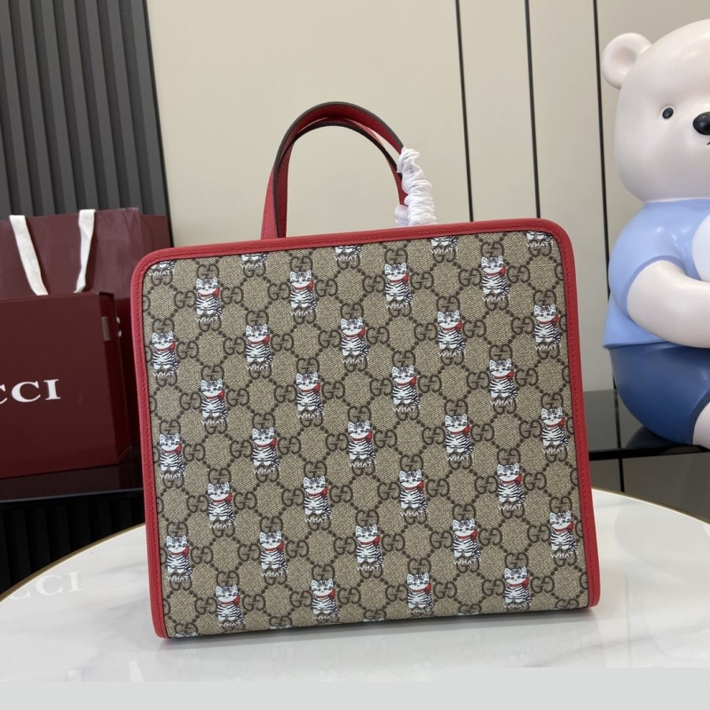 G*u*i shopping bags